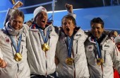 Gold medallists Norway's Boe, Bjoerndalen, Svendsen and Hanevold celebrate during medals ceremony for men's 4 X 7.5 kilometres relay biathlon event at Vancouver 2010 Winter Olympics at Whistler