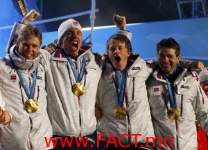 Gold medallists Norway's Boe, Bjoerndalen, Svendsen and Hanevold celebrate during medals ceremony for men's 4 X 7.5 kilometres relay biathlon event at Vancouver 2010 Winter Olympics at Whistler