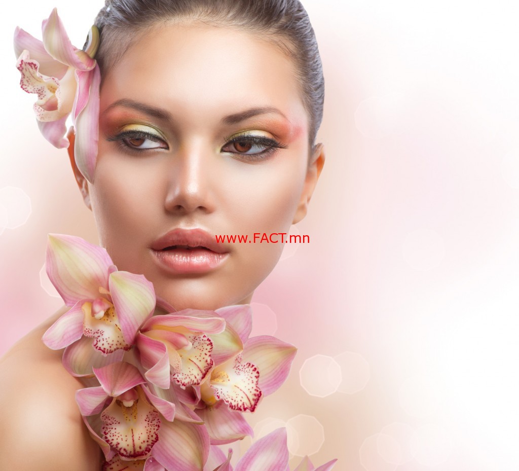 Beautiful Girl With Orchid Flowers. Perfect Make-up