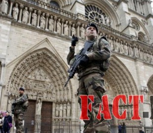 Soldiers patrol in front of the Notre Dame Cathedral in Paris after last Friday's series of deadly attacks in the French capital