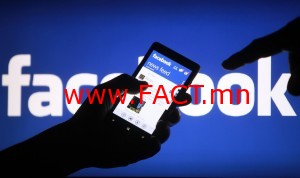 A smartphone user shows the Facebook application on his phone in Zenica, in this photo illustration