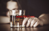 drugabuse-shutterstock293848514-woman_in_front_of_alcohol_glass-feature_image-alcohol_abuse