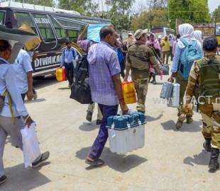 sasaram-polling-officials-carry-evms-and-other-election-materials-as-they-leave-